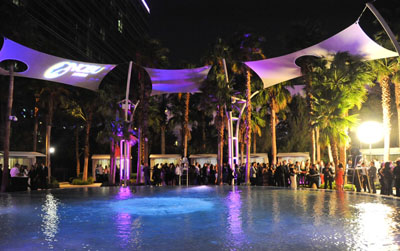 Guests surrounding Breathe Pool Photo Credit: © Patrick Gray / Erik Kabik Photography
