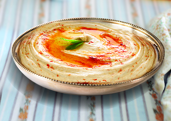 Extra Virgin Olive Oil & Chick Pea Hummus. Recipe Courtesy of Iberia