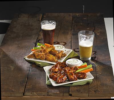Boston’s Restaurant & Sports Bar Springs for Wings