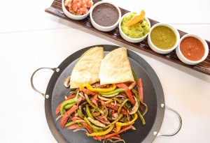 Vegan Fajitas with Onion, Tomato, Cactus, Peppers, Mushrooms, Beans, Guacamole and Salsa1