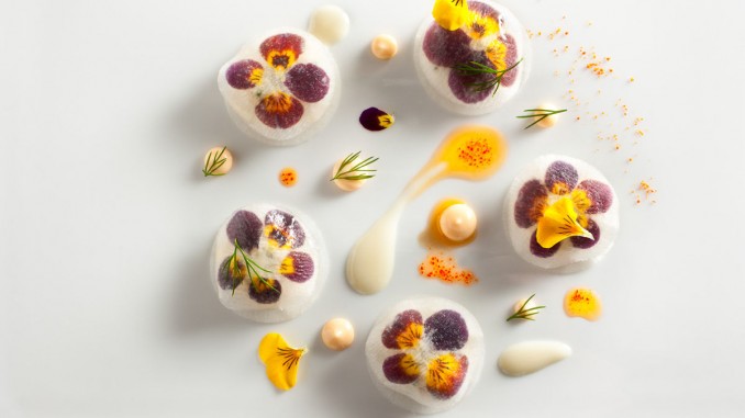 Peekytoe Crab with Pickled Daikon Radish and Violas prepared by Daniel Humm, Executive Chef of Eleven Madison Park in NYC.