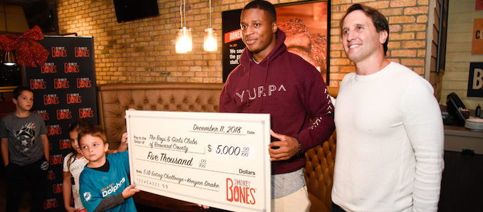 Miami Dolphins Running Back Kenyan Drake's Attempt to Devour Five Pounds of Smokey Bones' Bigger & Better Signature Dishes for Charity